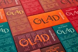 以暖色调来传达愉悦的情绪的GLAD豆棒巧克力视觉形象设计