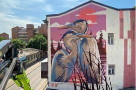 瓦迪姆·梅佐为街头艺术节“关于爱”创作的壁画：《沉默》